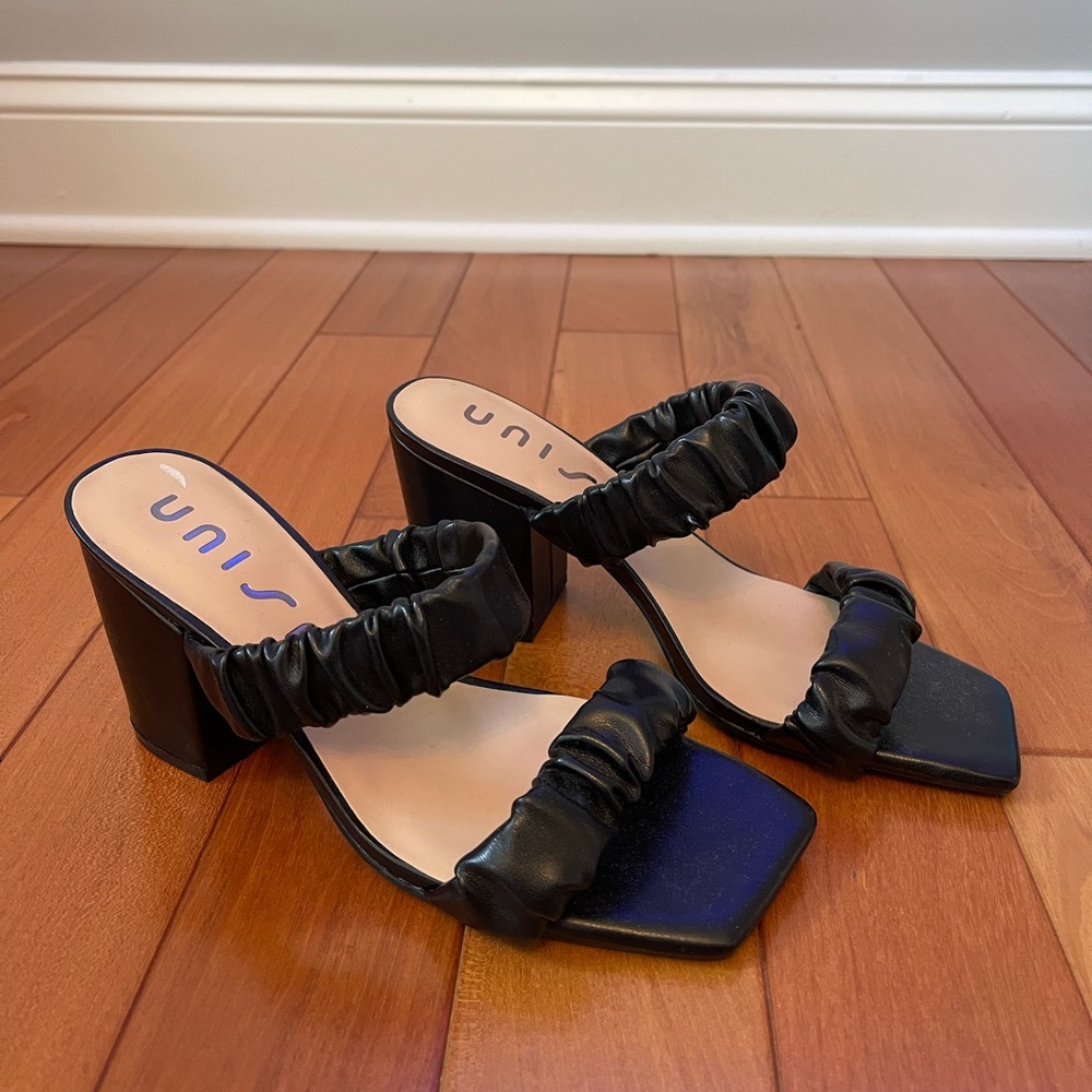 Never worn. Black kitten heels